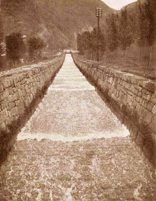 Roll waves in a steep irrigation canal