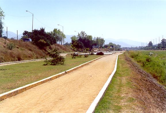 View of the Atoyac river looking downstream, <br>showing the left bank with gabions